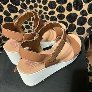 New Sorel sandals never worn.